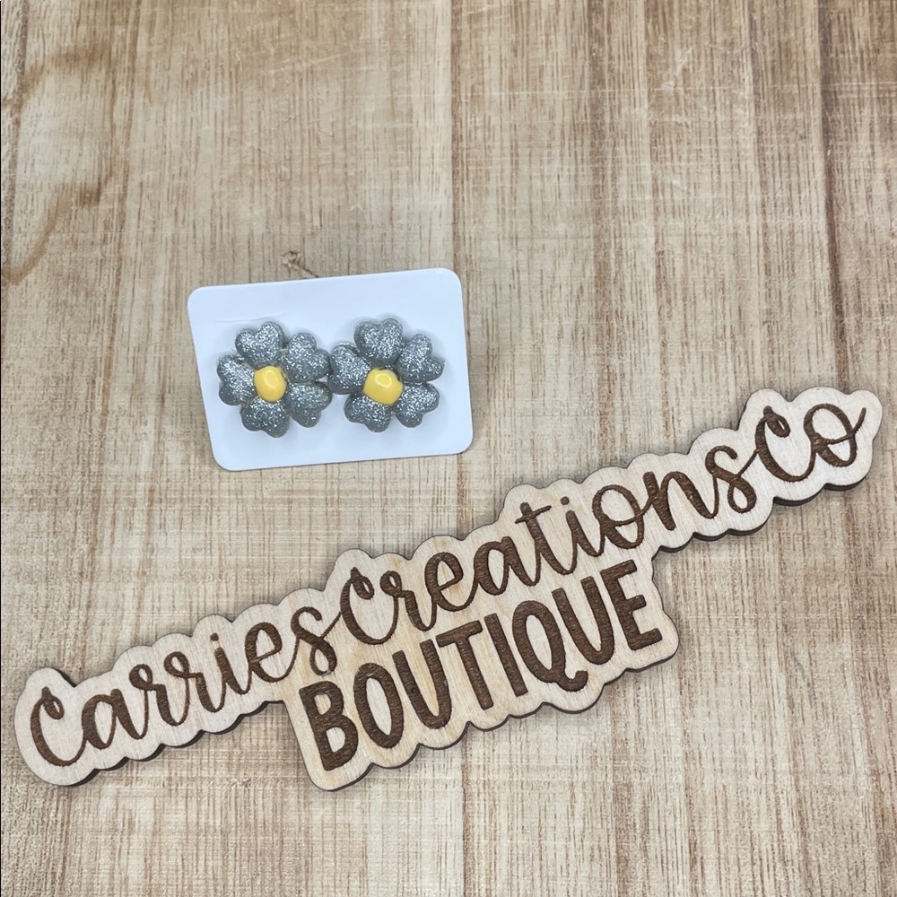 Silver Glitter Flower Stud Earrings with Yellow Centers